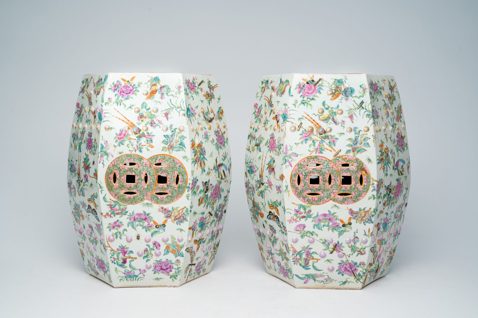 A pair of Chinese Canton famille rose hexagonal garden seats with birds, butterflies and insects amo - Image 2 of 7