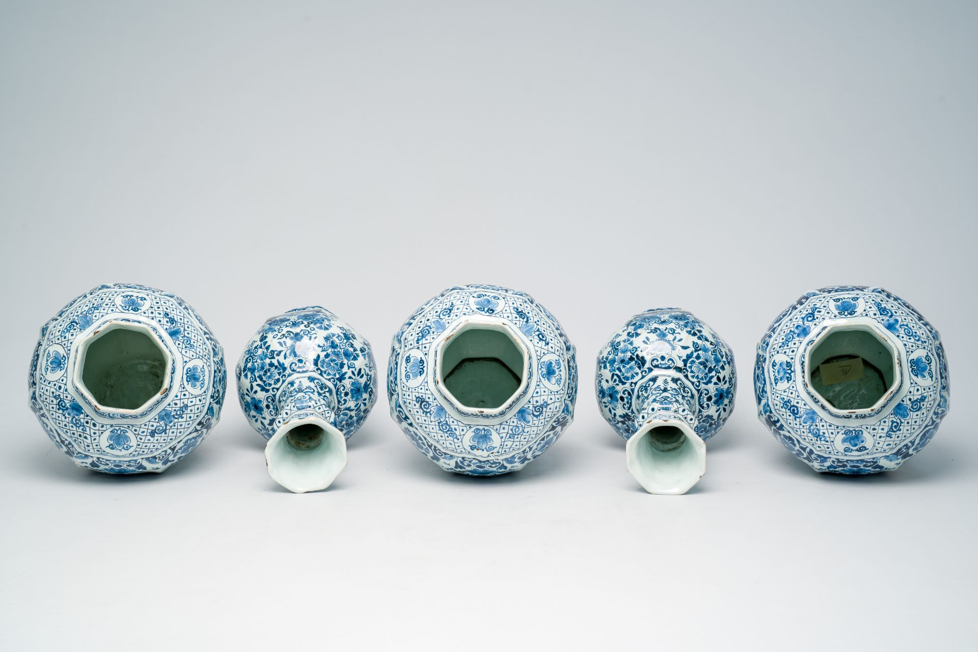 A Dutch Delft blue and white five-piece vase garniture with flower baskets and birds among blossomin - Image 5 of 8