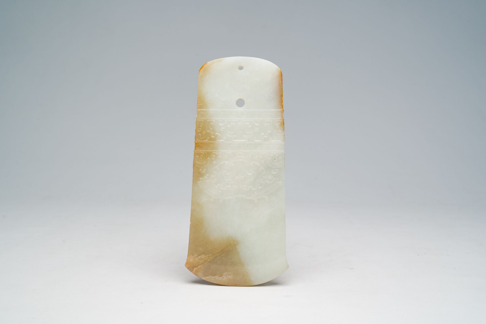 A Chinese jade ax head with relief design, 19th/20th C. - Image 2 of 2