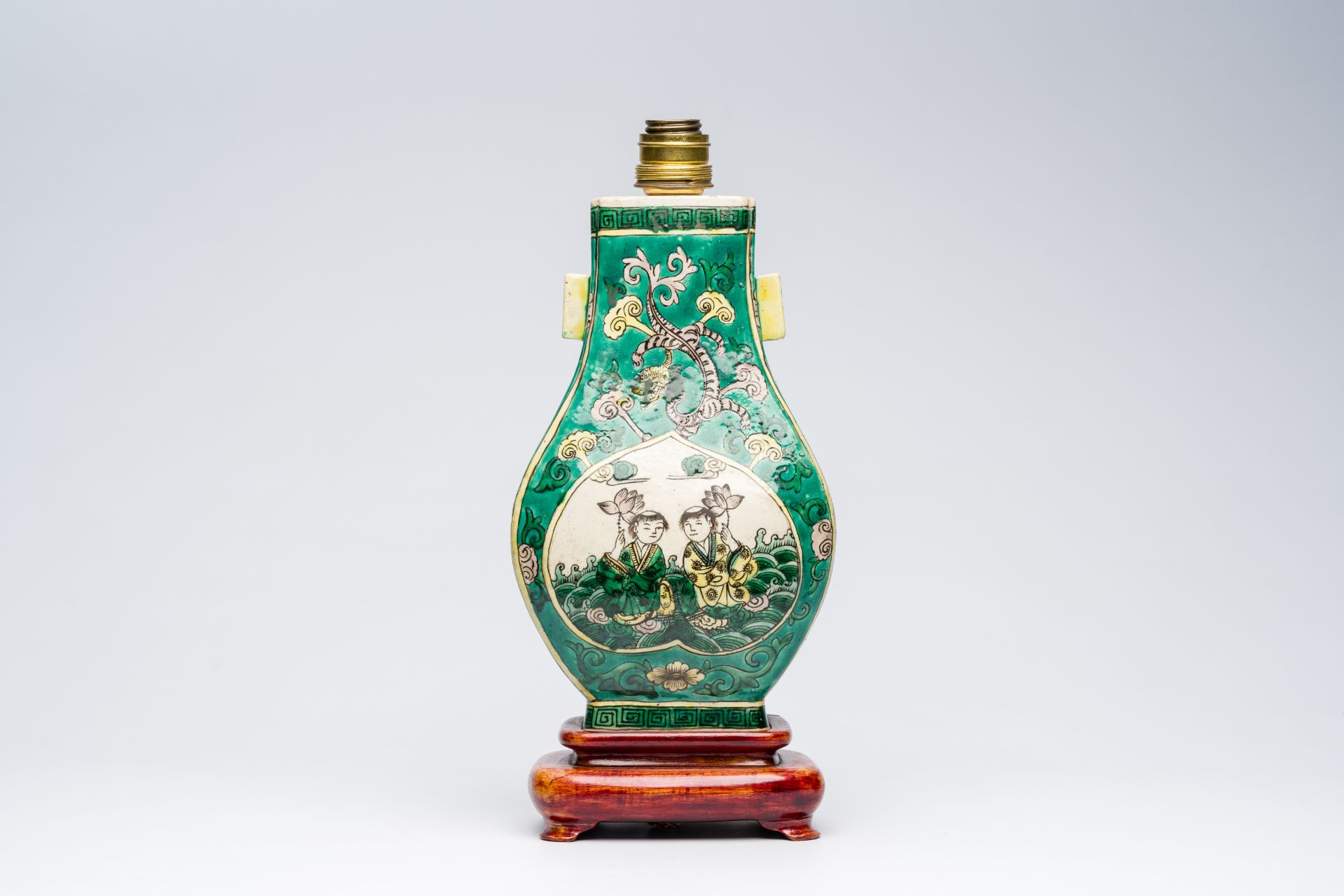 A Chinese verte biscuit 'fanghu' vase with two boys mounted as a lamp, 19th C. - Image 2 of 7