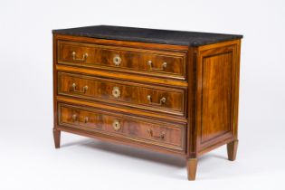 A French Neoclassical brass mounted wood chest of drawers with bluestone top, 19th/20th C.