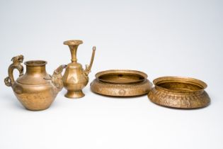 Two hammered brass bowls and two ewers, Tibet, 19th/20th C.