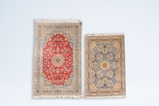 Two Persian Tabriz and Nain rugs with floral design, wool and silk on cotton, Iran, 20th C.