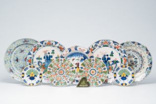 Nine Dutch Delft polychrome dishes and plates and a black Delftware sweetmeat dish, 18th/19th C.