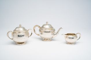 A three-piece French silver tea set with floral design, 950/000, maker's mark Odiot, Paris, 19th/20t