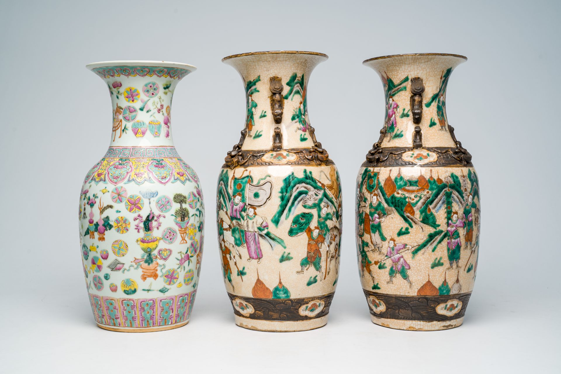 Two Chinese Nanking crackle glazed famille rose 'warrior' vases and an 'antiquities' vase, 19th C. - Image 3 of 7