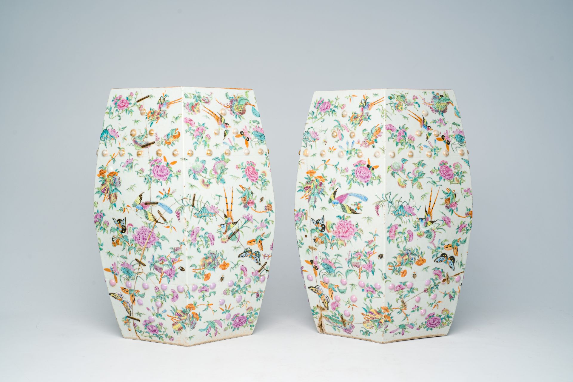 A pair of Chinese Canton famille rose hexagonal garden seats with birds, butterflies and insects amo - Image 3 of 7