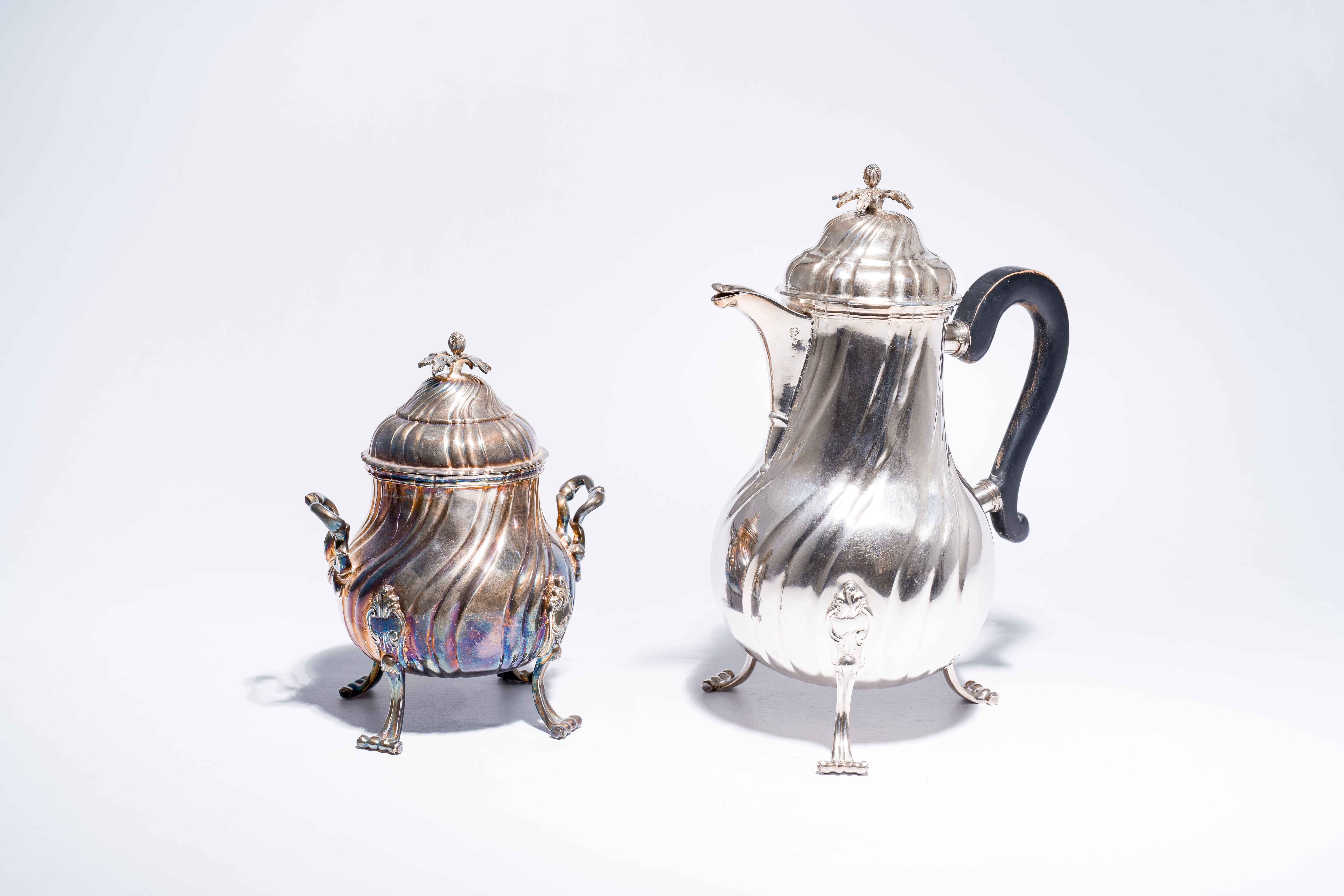 A silver Louis XV style coffee pot, Lille, maker's mark R.I.D., dated [17]84 and a sugar jar, maker'