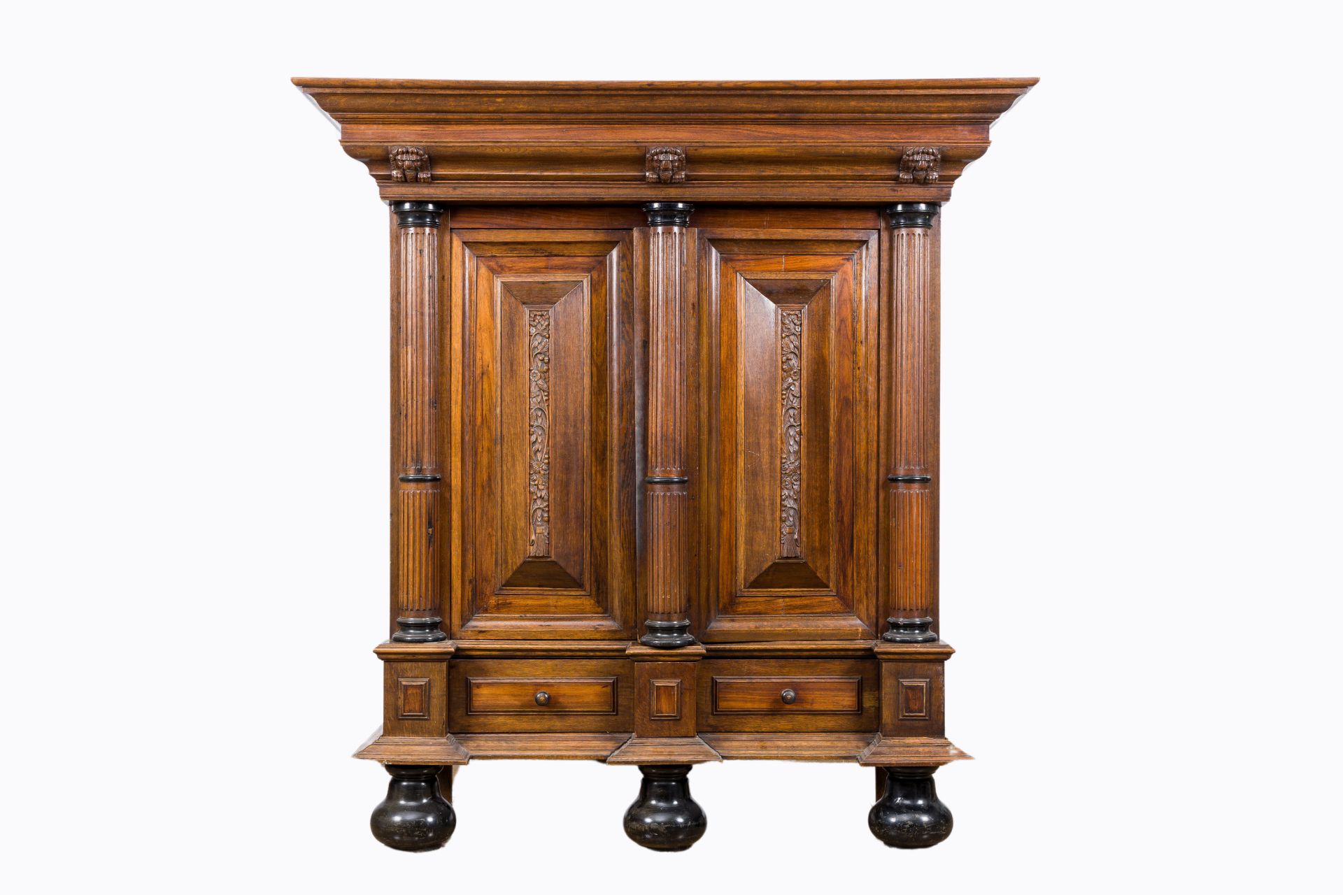 A Dutch partly ebonised wood two-door cupboard, 19th/20th C.