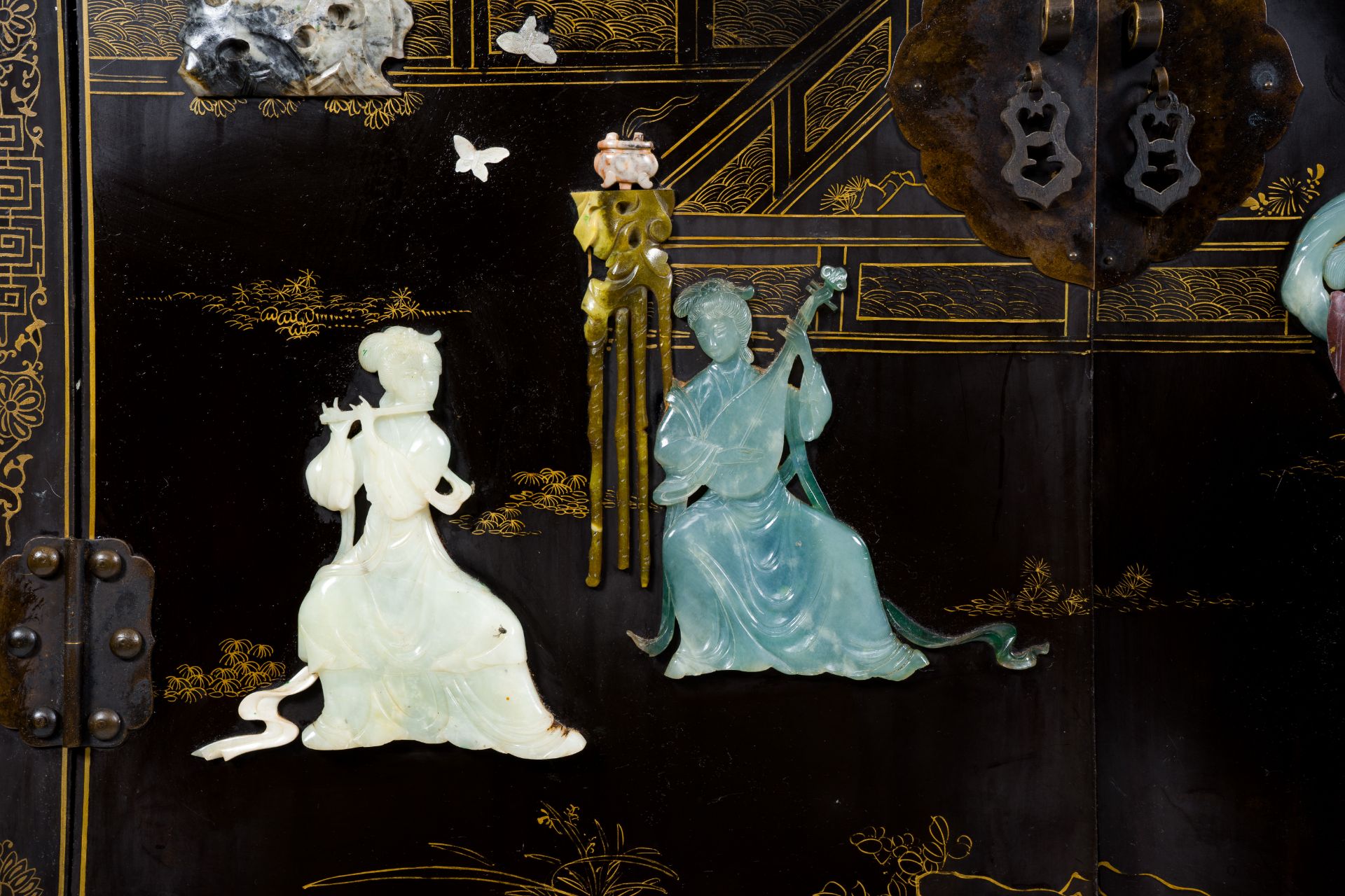 A Chinese lacquered wood cabinet inlaid with semi-precious stones showing ladies on a terrace, flowe - Image 4 of 13