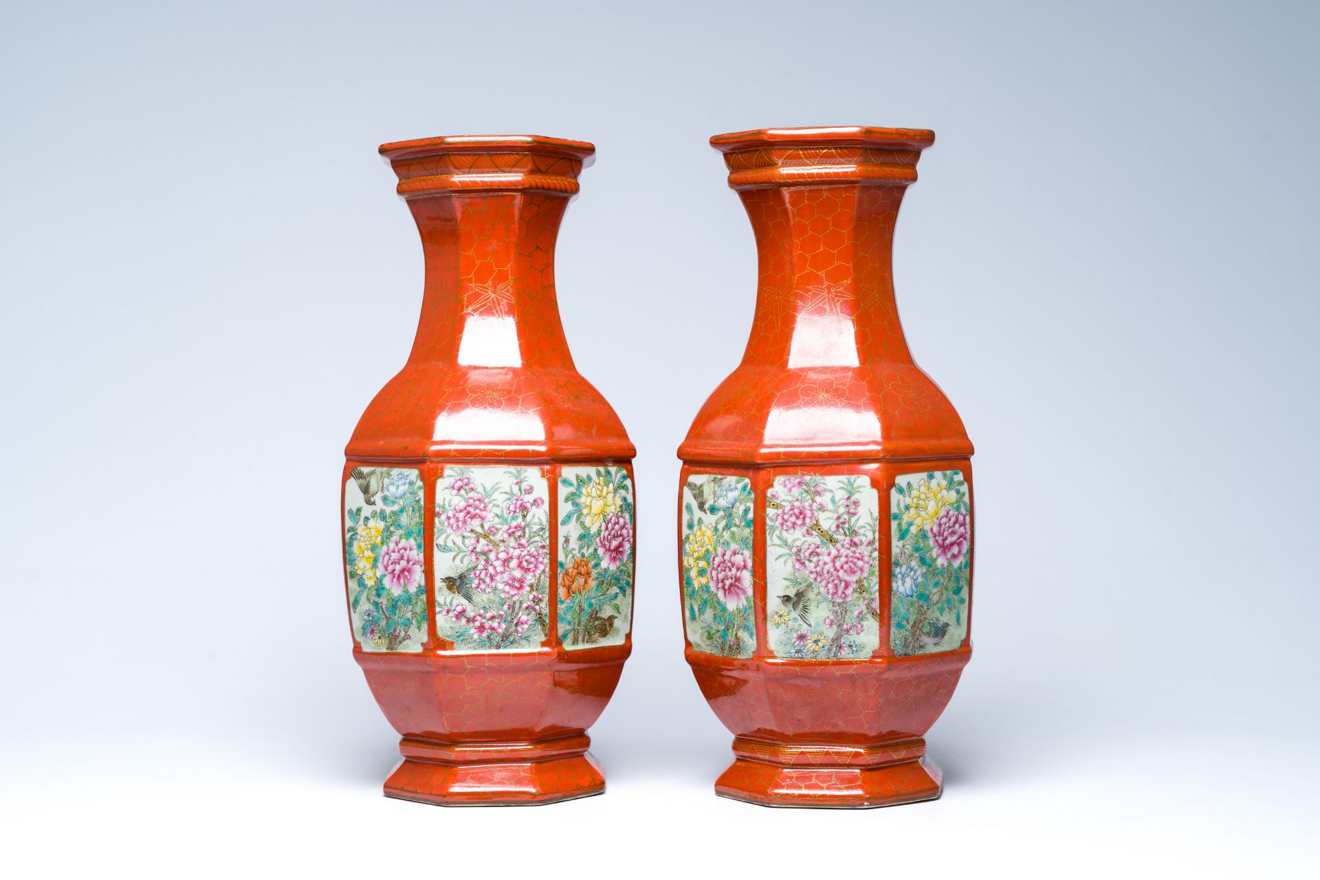 A pair of Chinese famille rose coral-red ground vases with birds among blossoming branches, Qianlong - Image 3 of 6