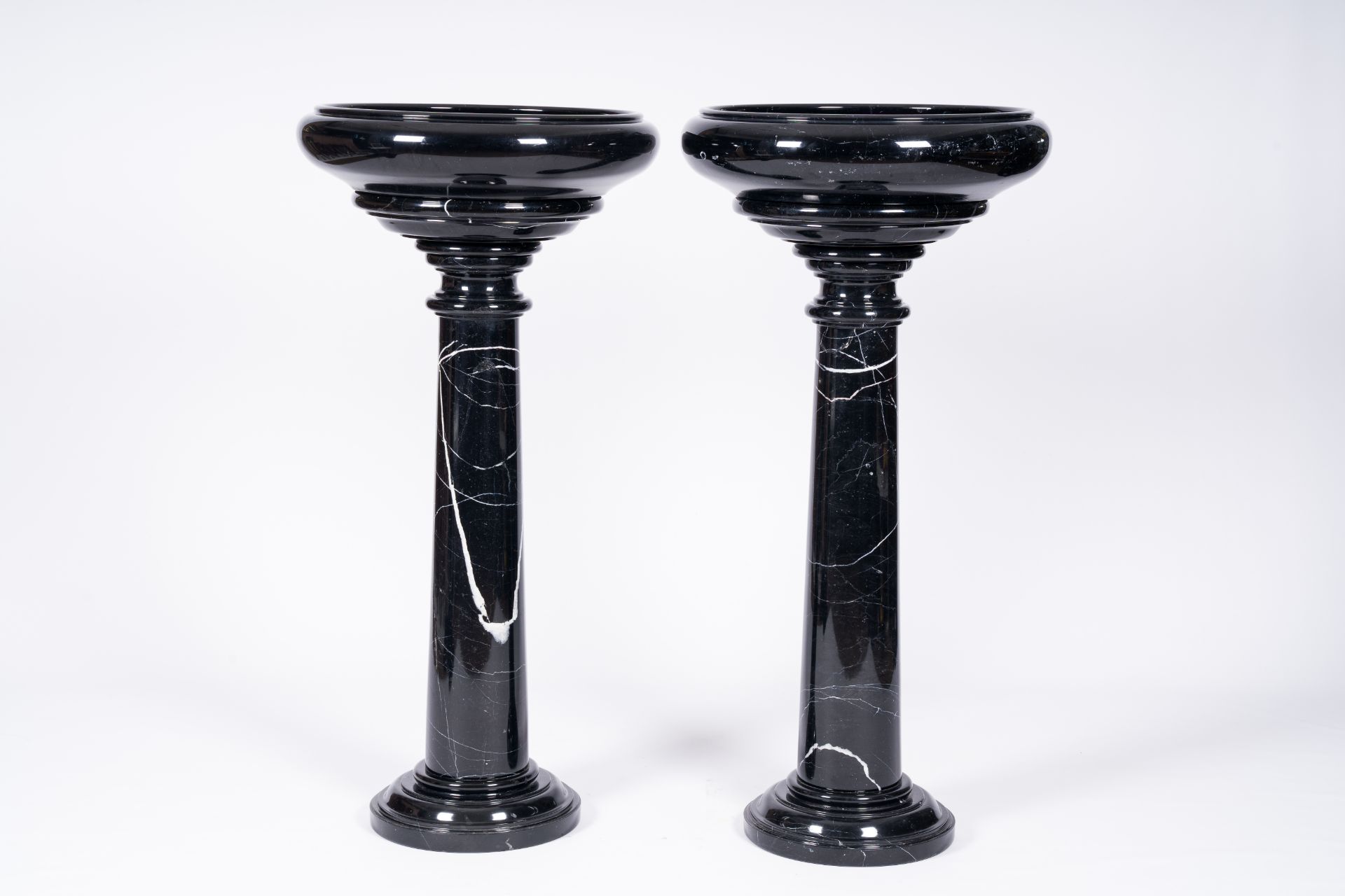 A pair of Italian black-grey marble pedestals crowned with a bowl, 20th C. - Image 3 of 6