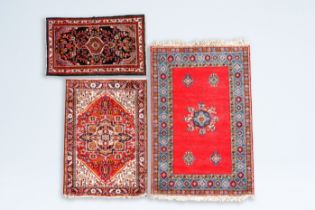 Three various Oriental rugs with floral design, wool on cotton, 20th C.
