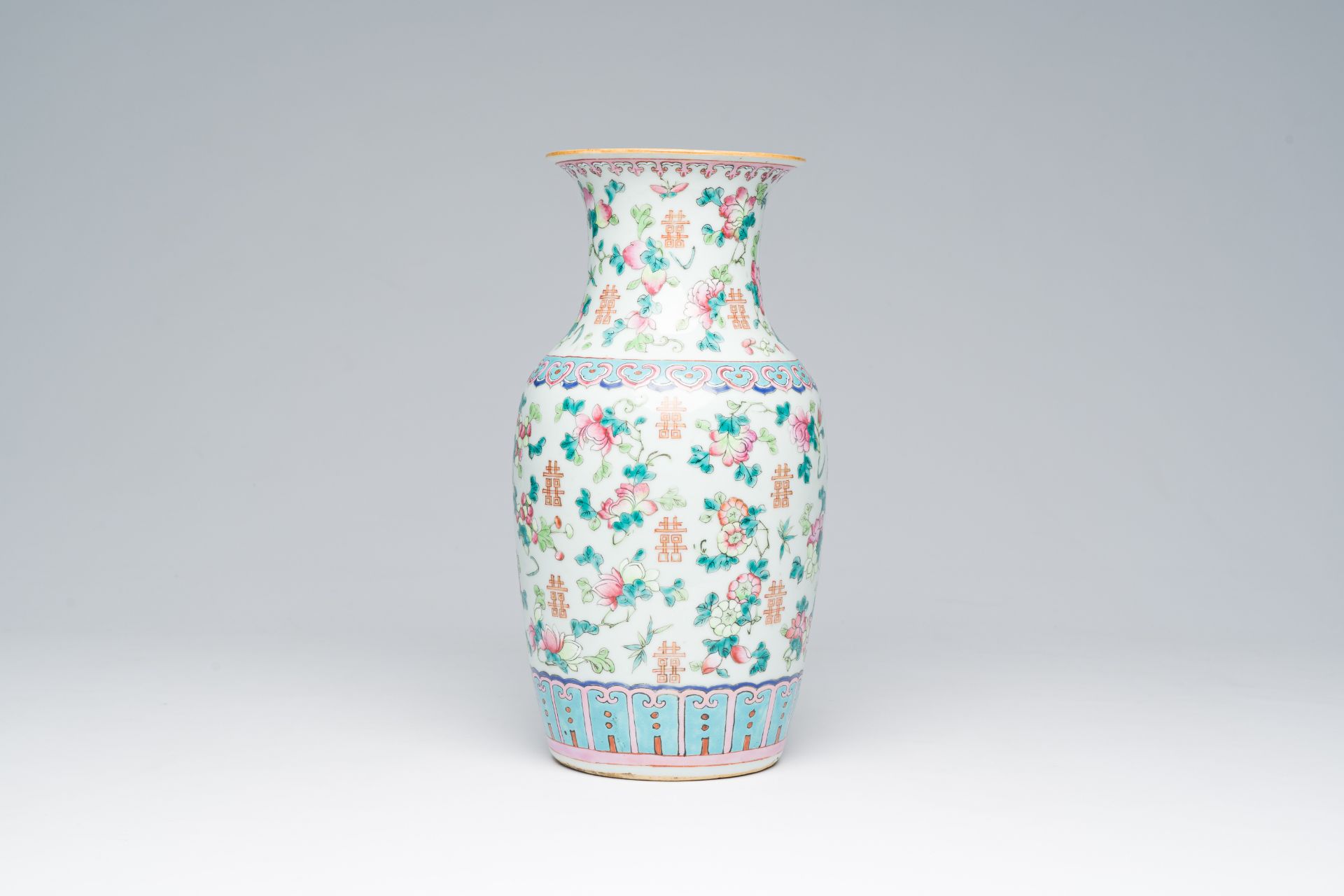 A Chinese famille rose vase with floral design, 19th C.