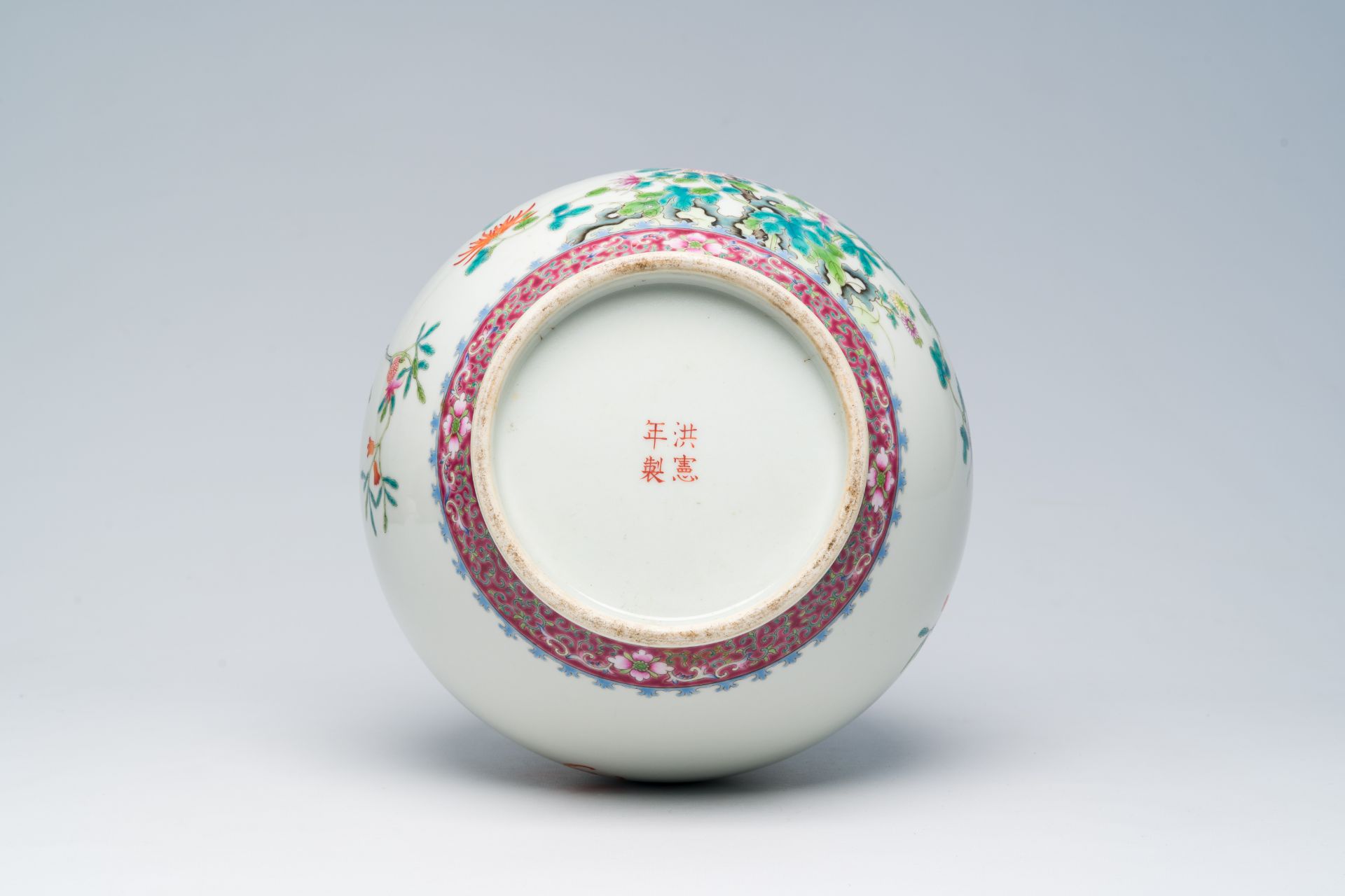 A Chinese famille rose bottle shaped vase with floral design, Hongxian mark, 20th C. - Image 6 of 6
