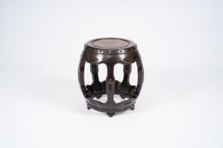 A Chinese open worked carved wood garden seat, 19th/20th C.