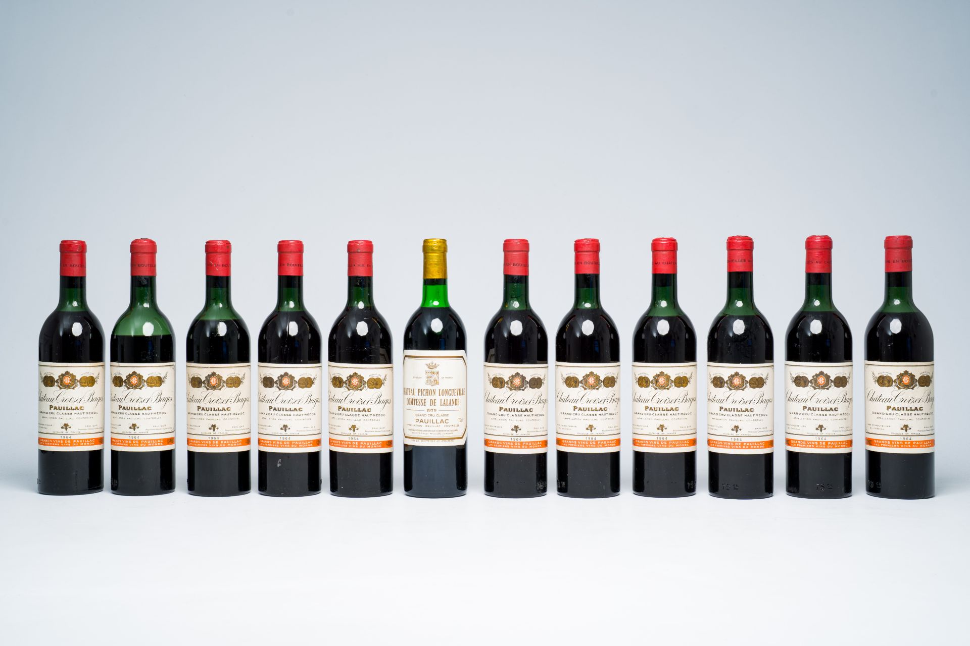 Eleven bottles of Chateau Croizet-Bages and a bottle of Chateau Pichon Longueville Comtesse de Lalan