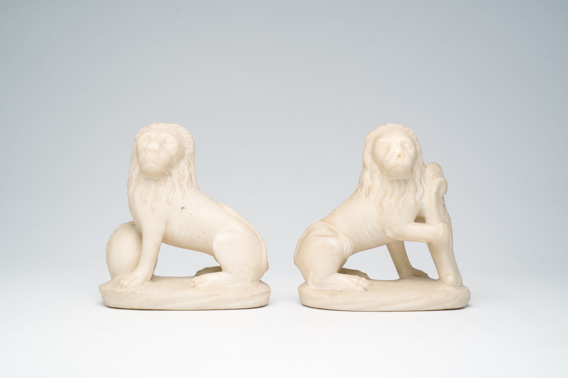 A pair of Italian marble lions holding shields with coats of arms, 19th C. - Image 2 of 8