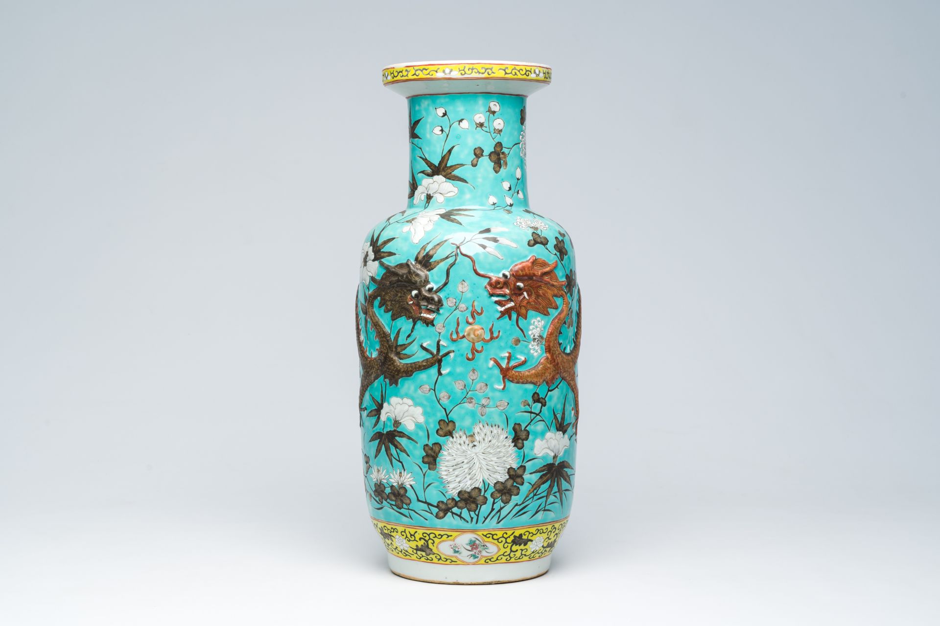 A Chinese famille rose turquoise ground Dayazhai style 'dragons chasing the pearl' vase, 19th C.