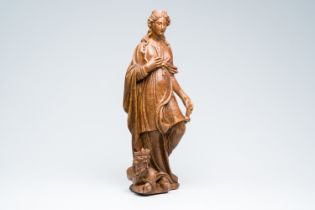 A Flemish carved oak group depicting Saint Catherine of Alexandria with the emperor Maxentius at her