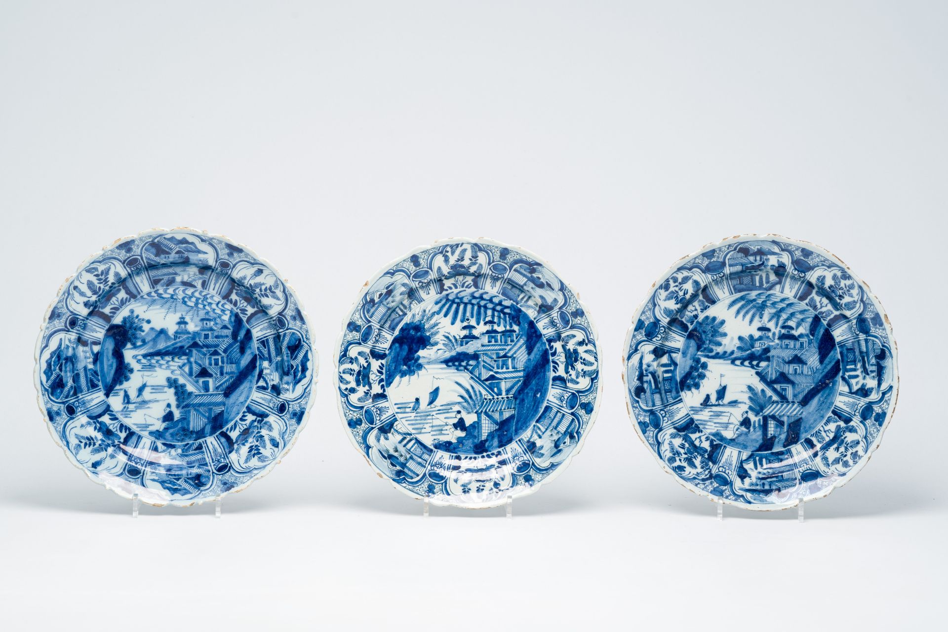 Seven Dutch Delft blue and white 'chinoiserie' dishes, 18th C. - Image 4 of 7