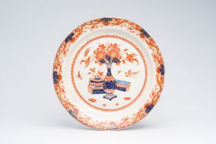 A Dutch Delft polychrome petit feu 'antiquities' dish, 18th C.