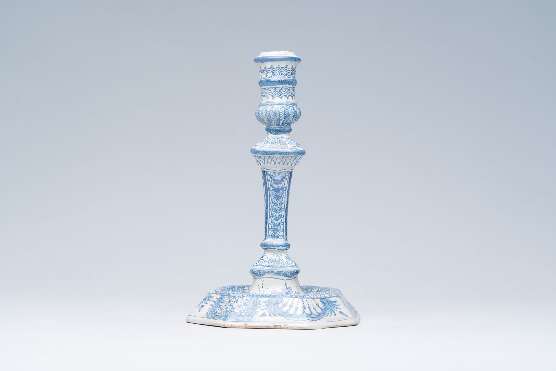 A German blue and white richly decorated earthenware candlestick, Nuremberg, 18th C. - Image 5 of 7