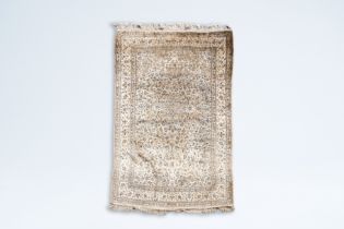 A Persian Nain silk rug with floral design, marked Sultani, 6la, Iran, 20th C.