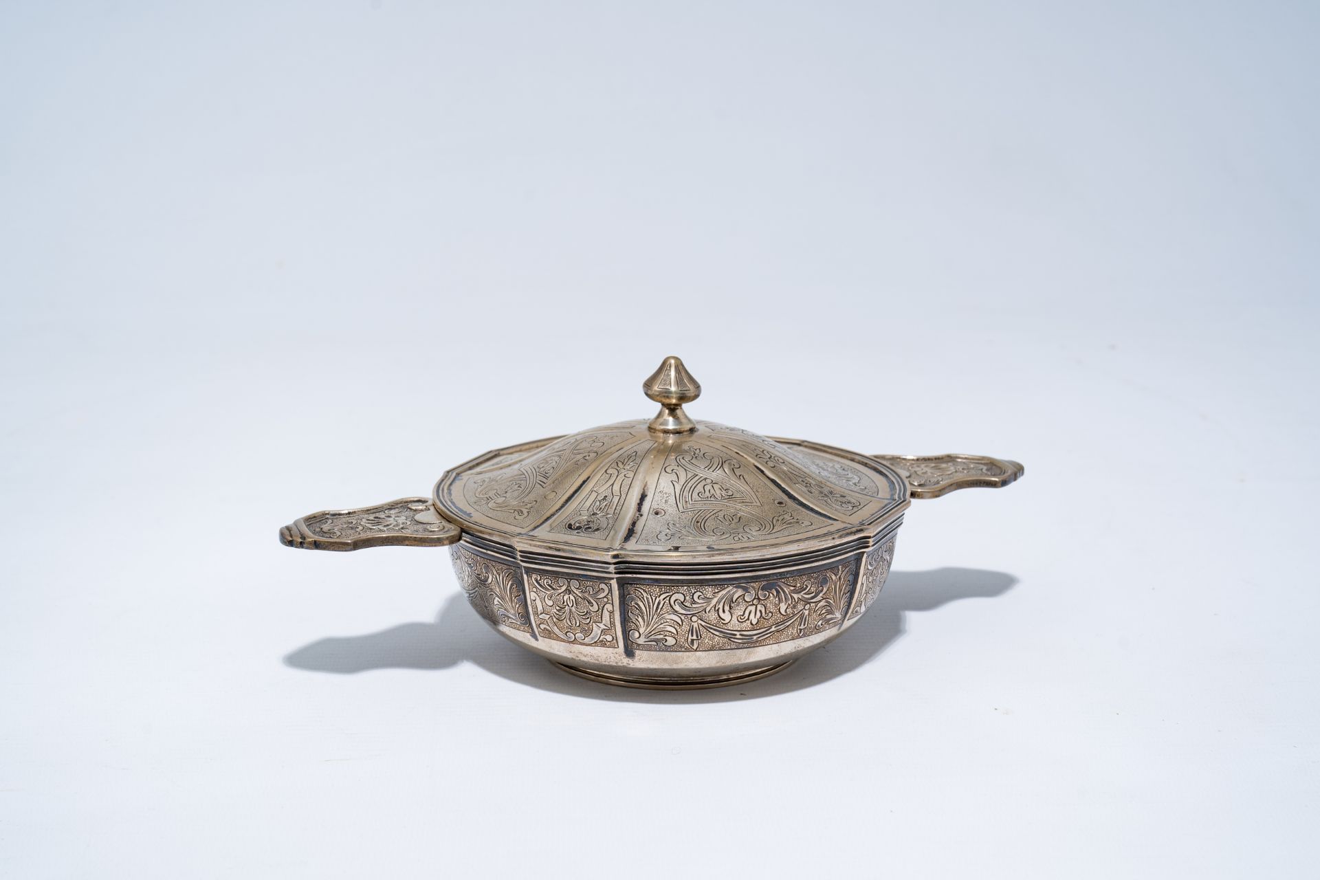 A Belgian silver bowl and cover with floral design, maker's mark Wolfers, 800/000, 20th C.