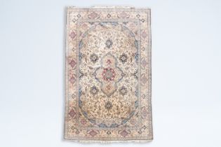 A Persian Nain rug with floral design, wool and silk on cotton, 9la, Iran, 20th C.