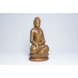 A tall Thai inlaid gilt wood figure of a seated Buddha, 20th C.