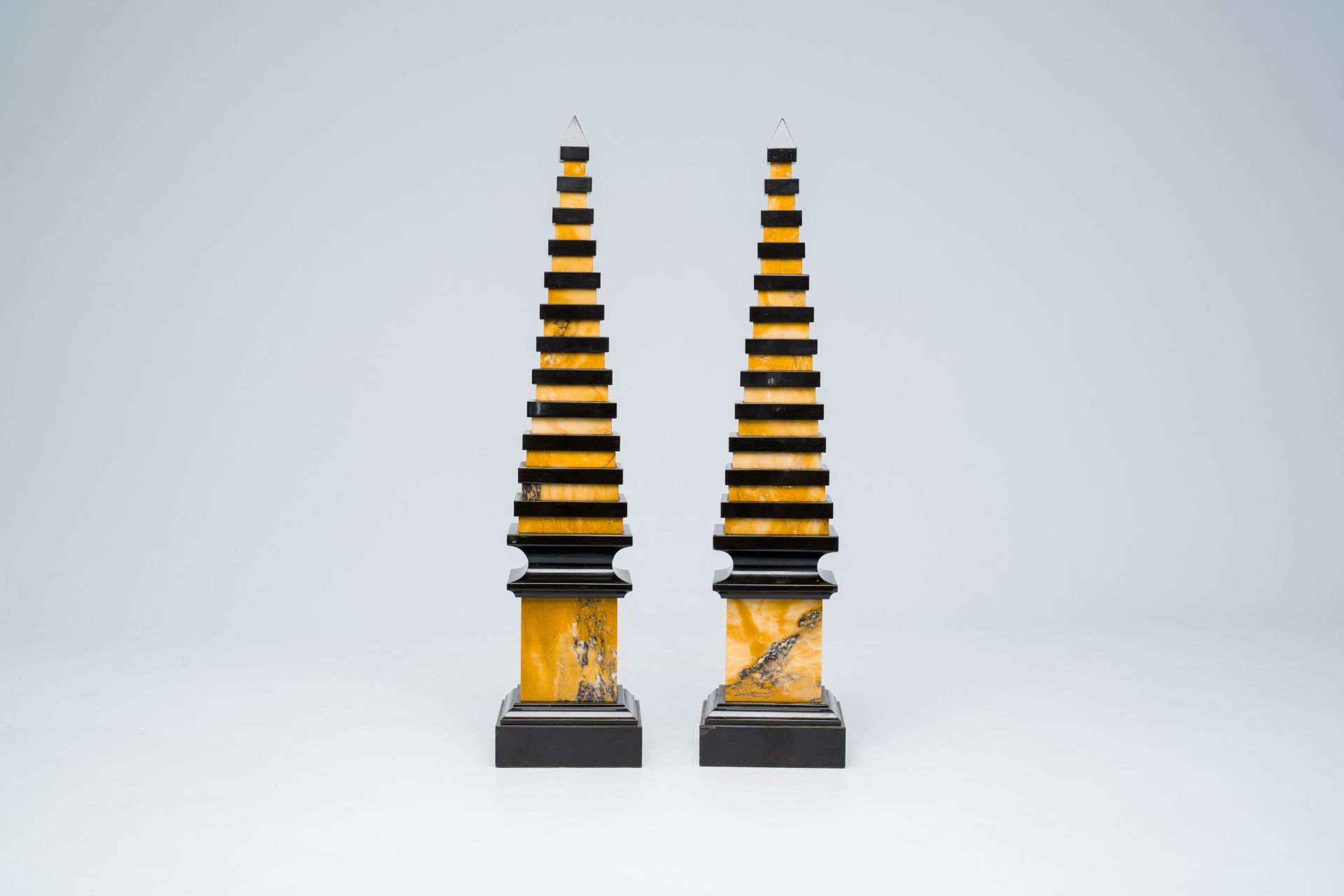 A pair of Italian Neoclassical black and yellow marble obelisks, 20th C. - Image 4 of 7