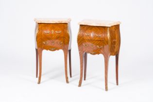 A pair of French bronze mounted veneered wood side tables with marble tops, 19th/20th C.
