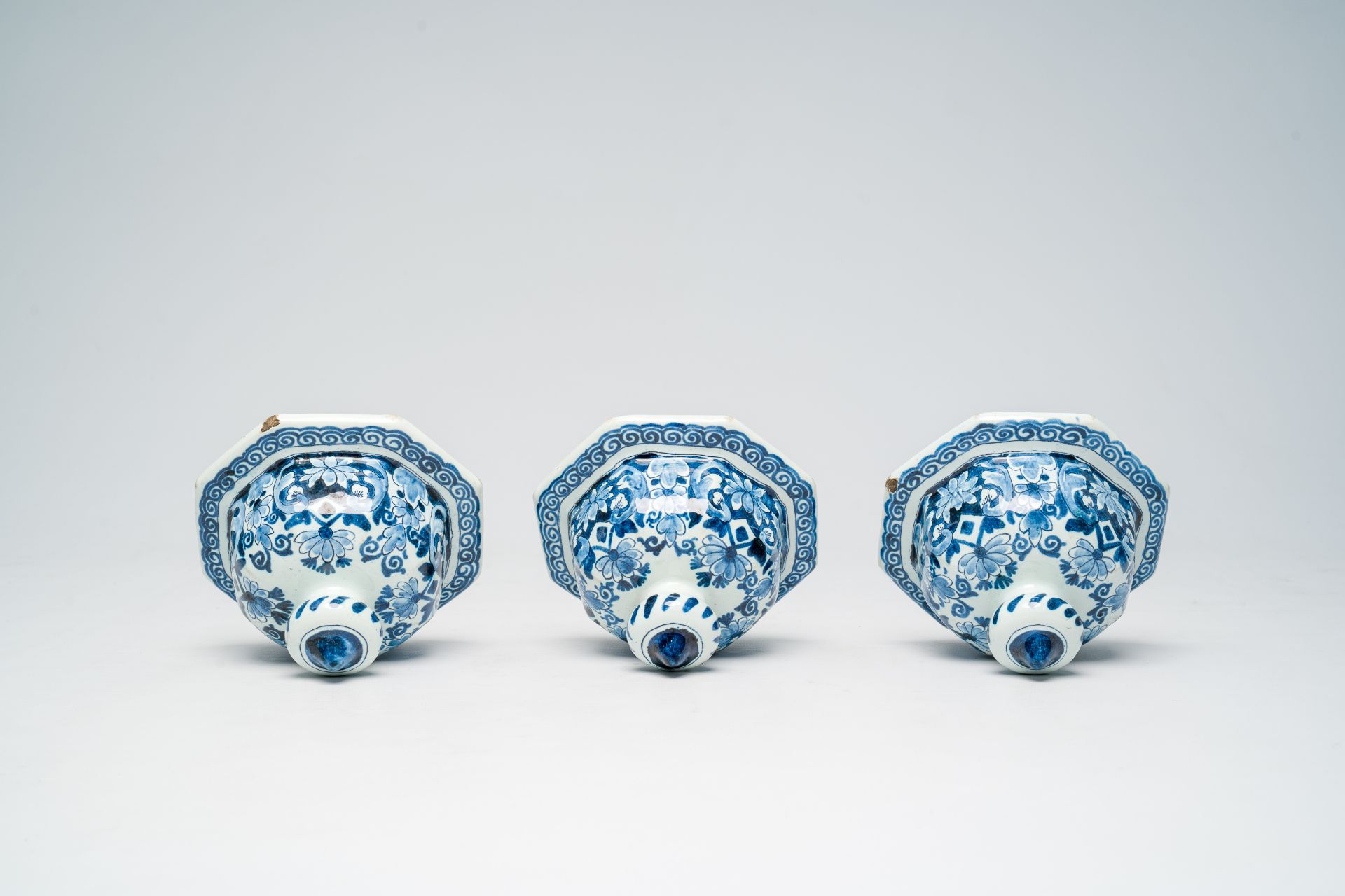 A Dutch Delft blue and white five-piece vase garniture with flower baskets and birds among blossomin - Image 7 of 8