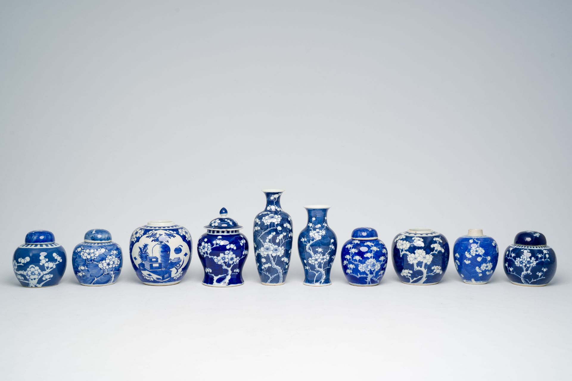 A varied collection of Chinese blue and white prunus on cracked ice ground porcelain, 19th/20th C. - Bild 8 aus 15