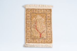 A Persian silk Goum 'Tree of Life' rug, Iran, 20th C.