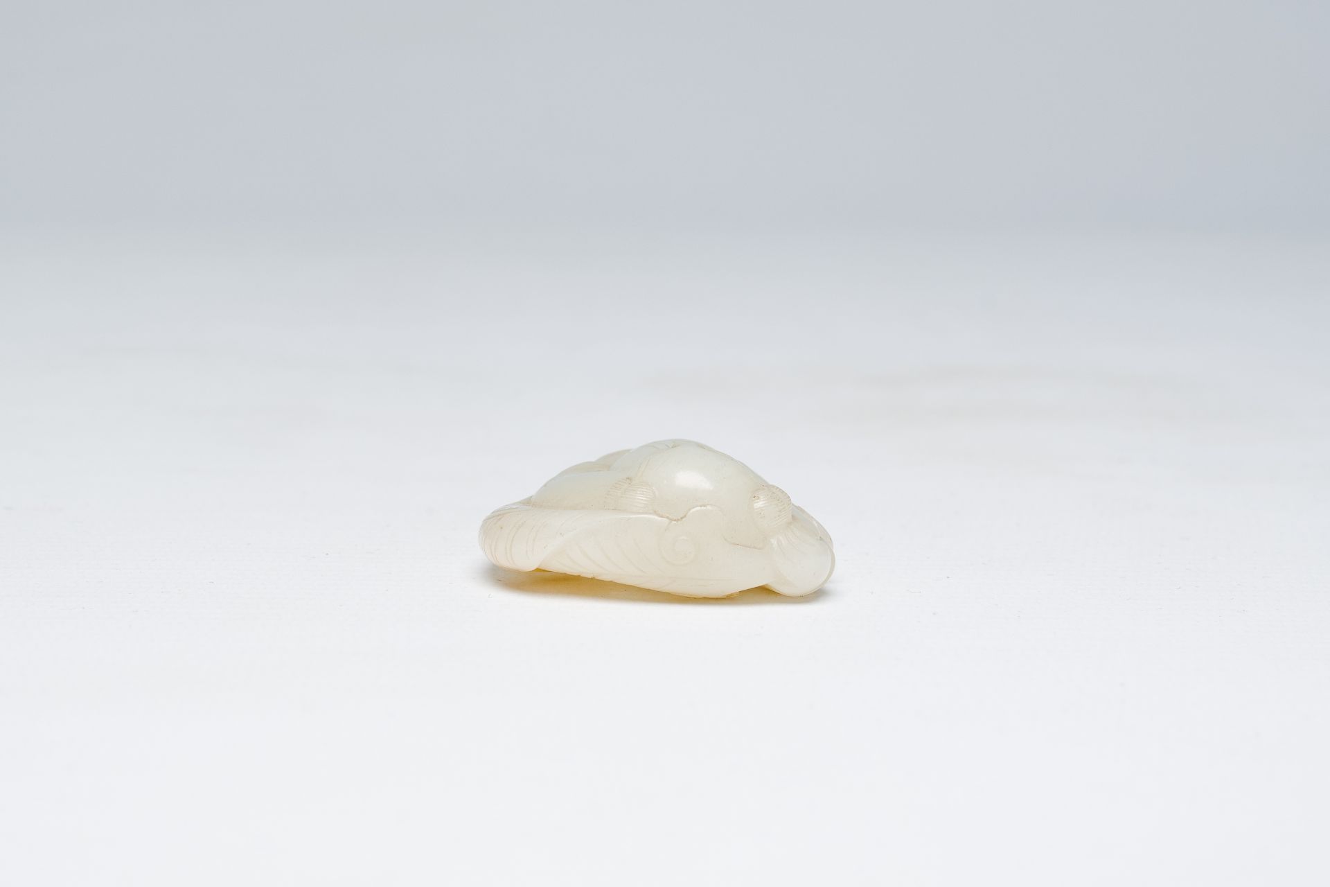 A Chinese white jade pendant with a boy, Qing - Image 4 of 6