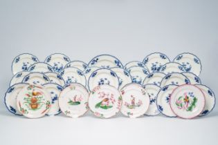 A varied collection of Tournai blue and white plates with floral design and five French faience de l