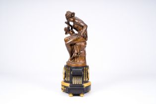 A French gilt bronze mounted ebonized wood mantle clock crowned with Galatea and Cupid, 19th/20th C.