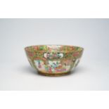 A Chinese Canton famille rose bowl with palace scenes and birds and butterflies among blossoming bra