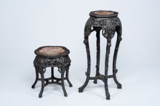 Two Chinese reticulated carved wood stands with marble top, 19th/20th C.