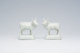 A pair of Dutch Delft white models of standing cows, 18th C.