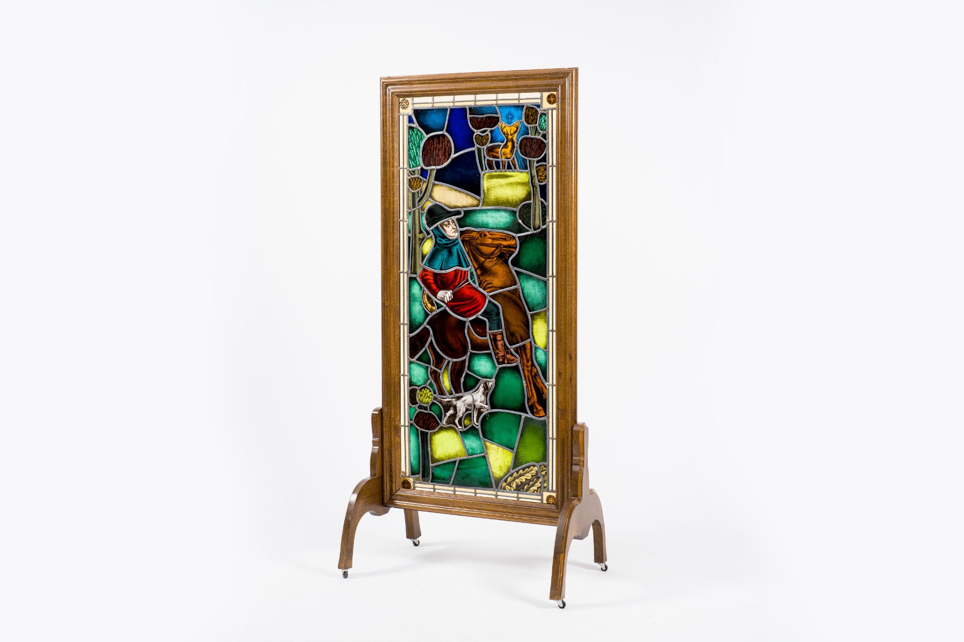 Frans Van Immerseel (1909-1978): A painted and stained glass 'Saint Hubertus' window in a wood frame