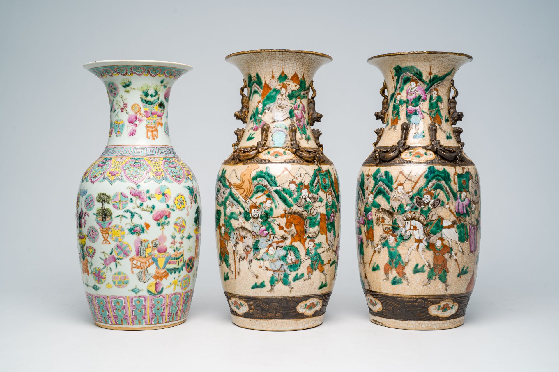 Two Chinese Nanking crackle glazed famille rose 'warrior' vases and an 'antiquities' vase, 19th C. - Image 4 of 7