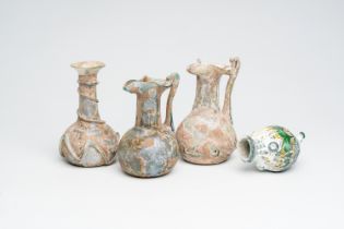 Four Roman style glass containers, various periods