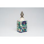 A polychrome Iznik-style tea caddy with silver cover, Boch Freres Keramis, first half 20th C.