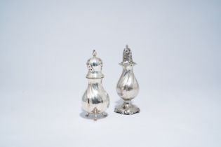 Two silver casters with twisted bodies, a.o. a Danish caster, 20th C.