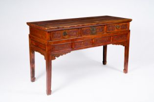 A Chinese wood wall console with antiquities and floral design, 19th/20th C.