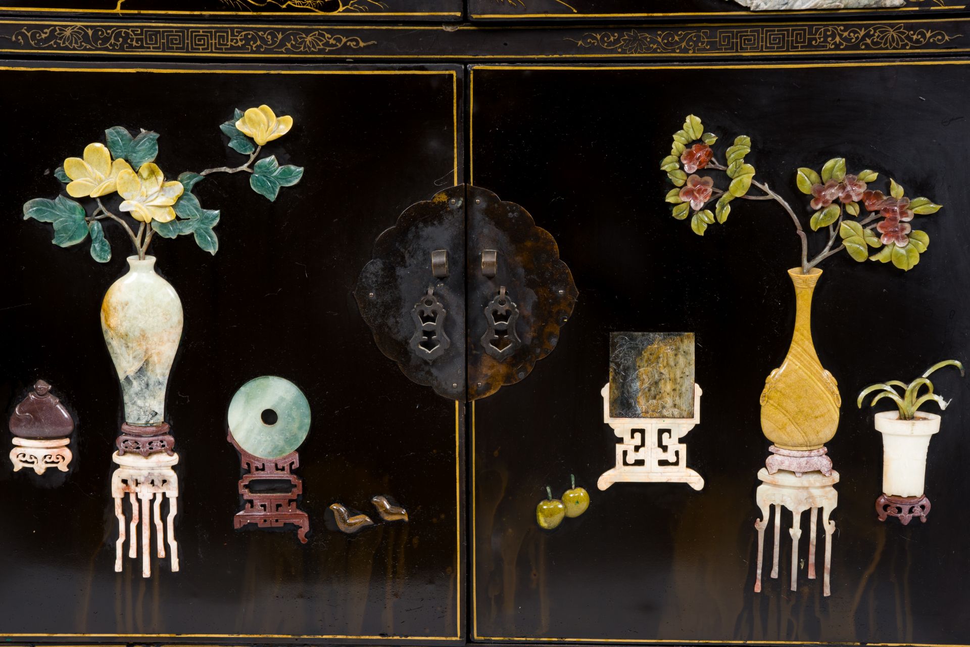 A Chinese lacquered wood cabinet inlaid with semi-precious stones showing ladies on a terrace, flowe - Image 6 of 13