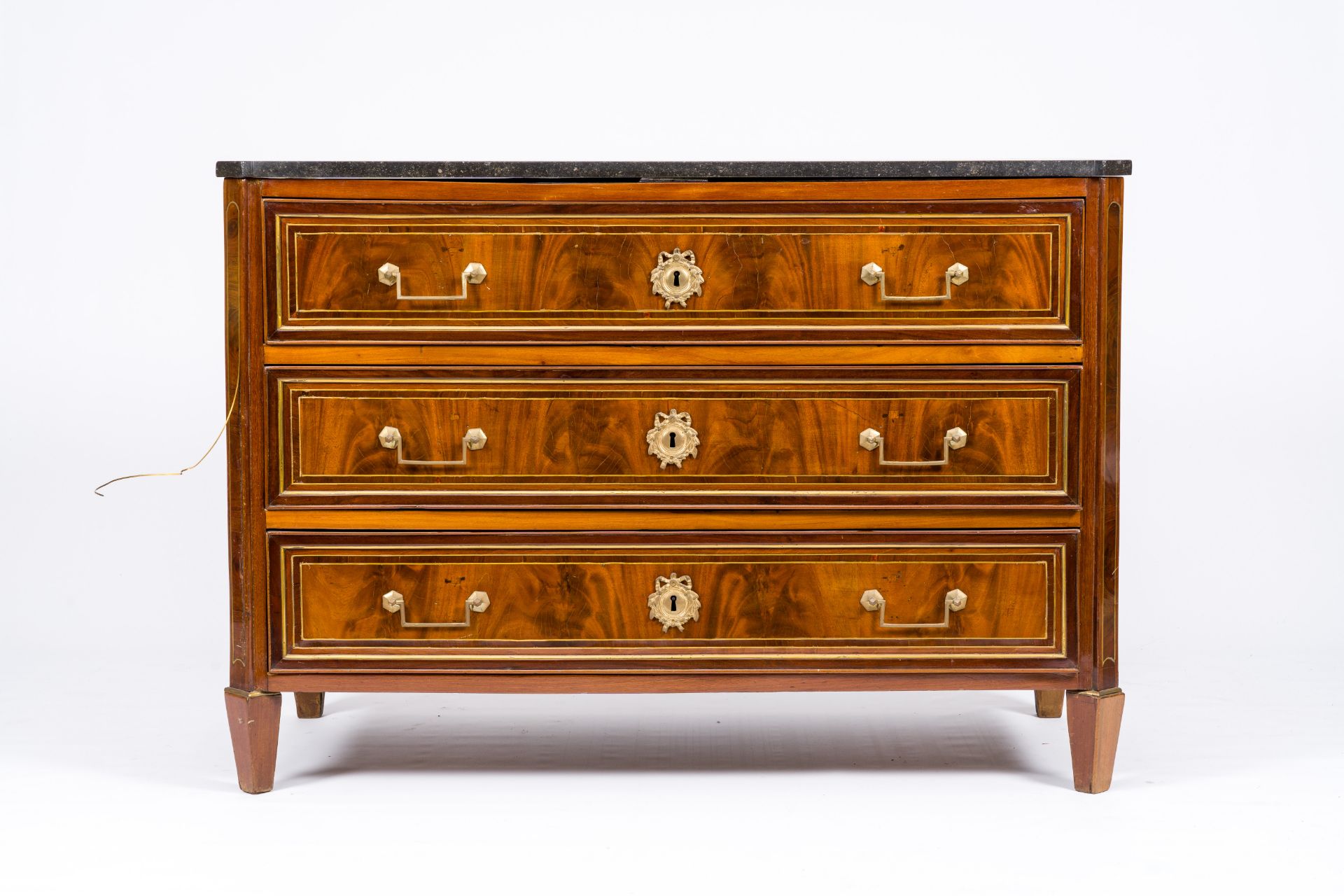 A French Neoclassical brass mounted wood chest of drawers with bluestone top, 19th/20th C. - Image 2 of 5